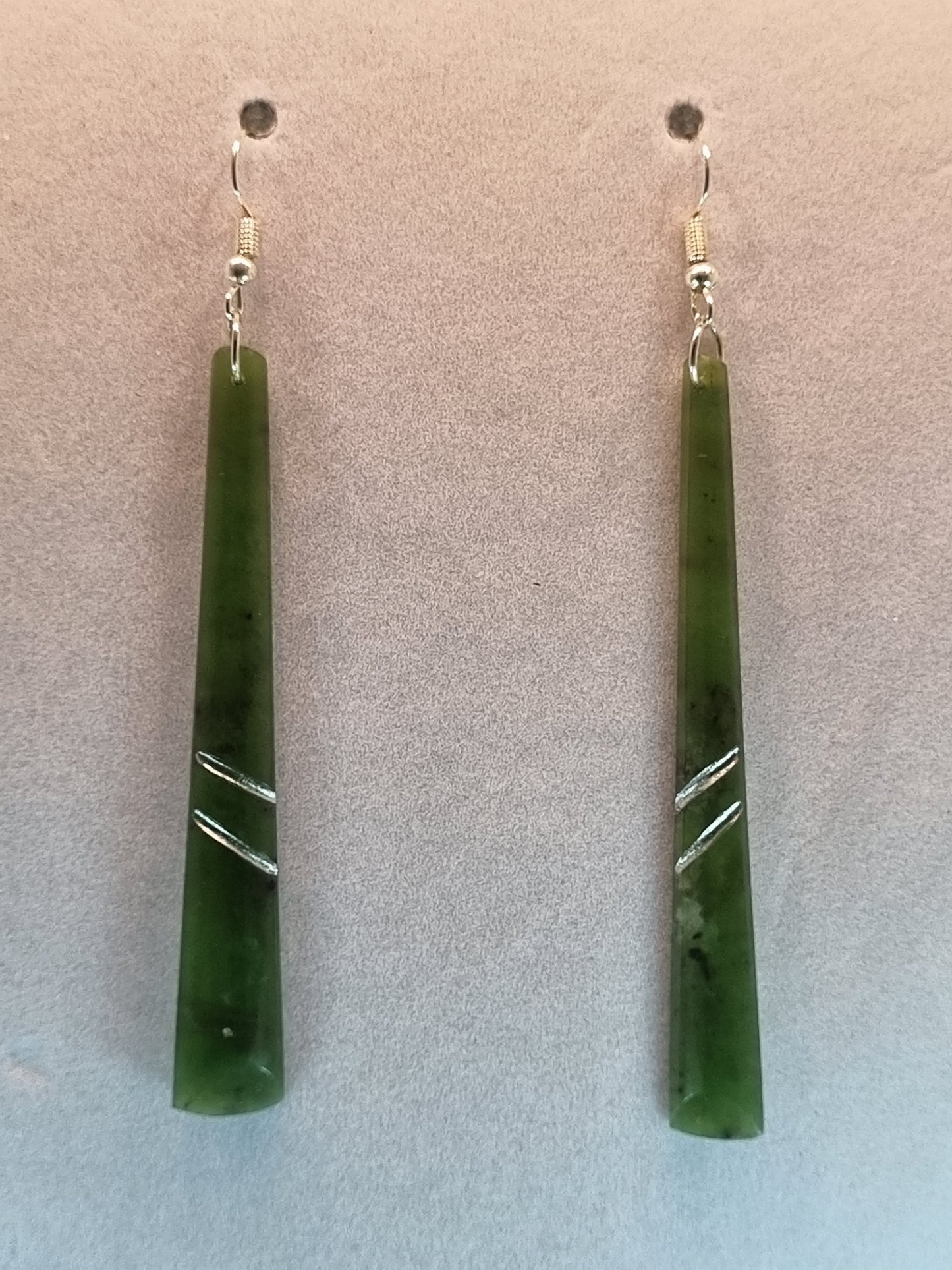 Pounamu drop earrings with double silver strips.